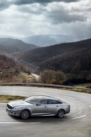 Das 2014 Jaguar Xjr Mountain Road Wallpaper 320x480