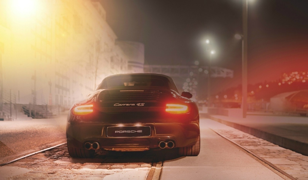 Black Porsche Carrera At Night screenshot #1 1024x600