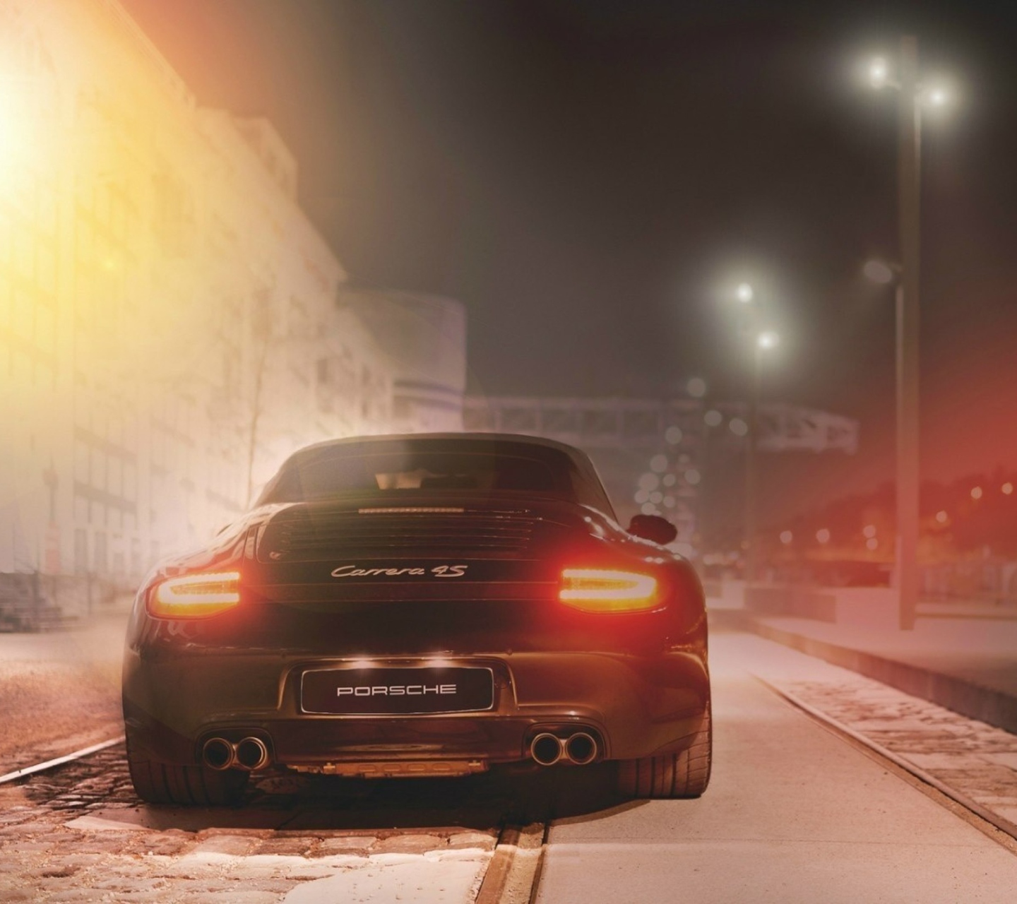 Das Black Porsche Carrera At Night Wallpaper 1440x1280