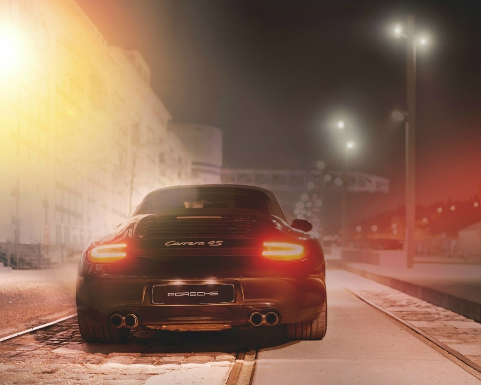 Black Porsche Carrera At Night wallpaper 1600x1280