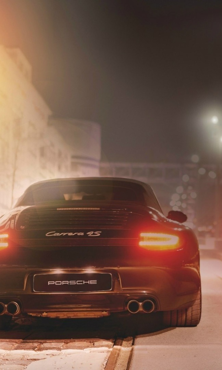Sfondi Black Porsche Carrera At Night 768x1280