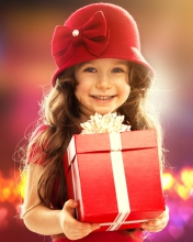 Happy Child With Present wallpaper 176x220