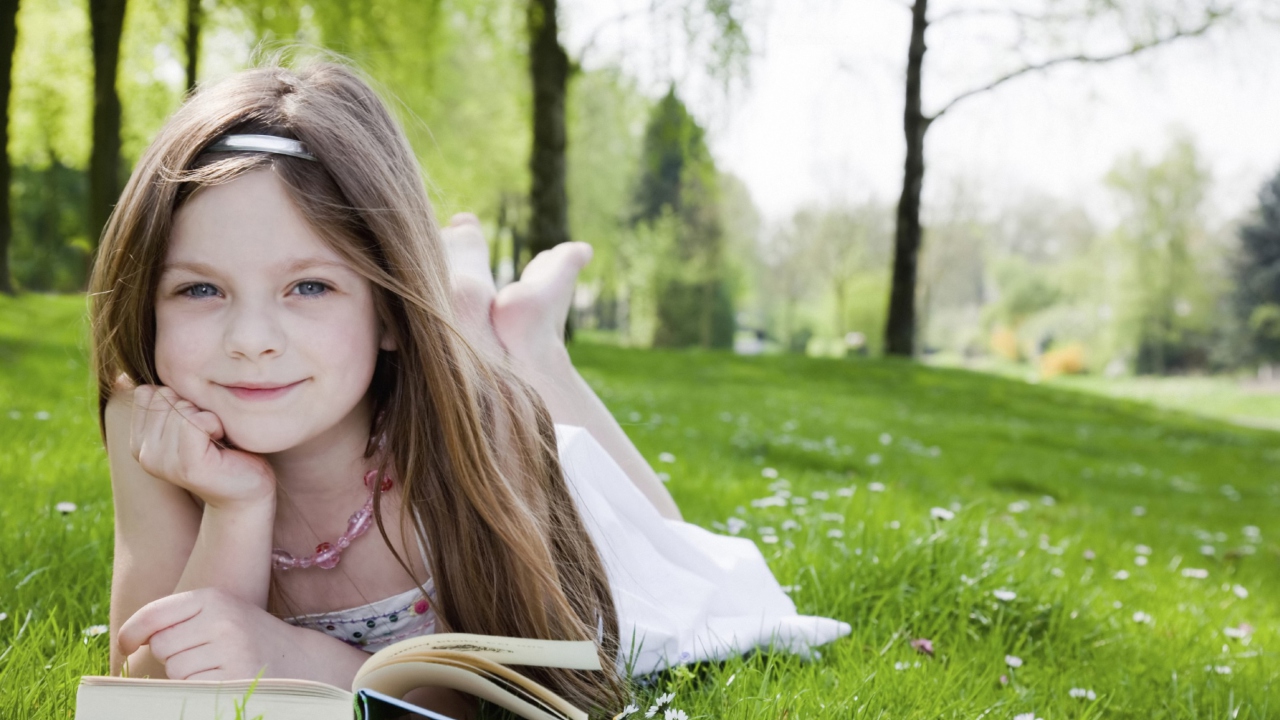 Cute Little Girl Reading Book In Garden screenshot #1 1280x720