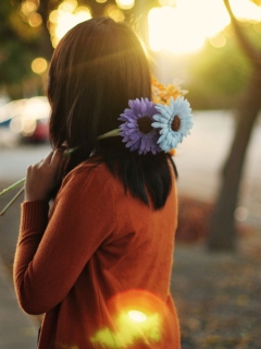Girl With Two Blue Gerberas wallpaper 240x320