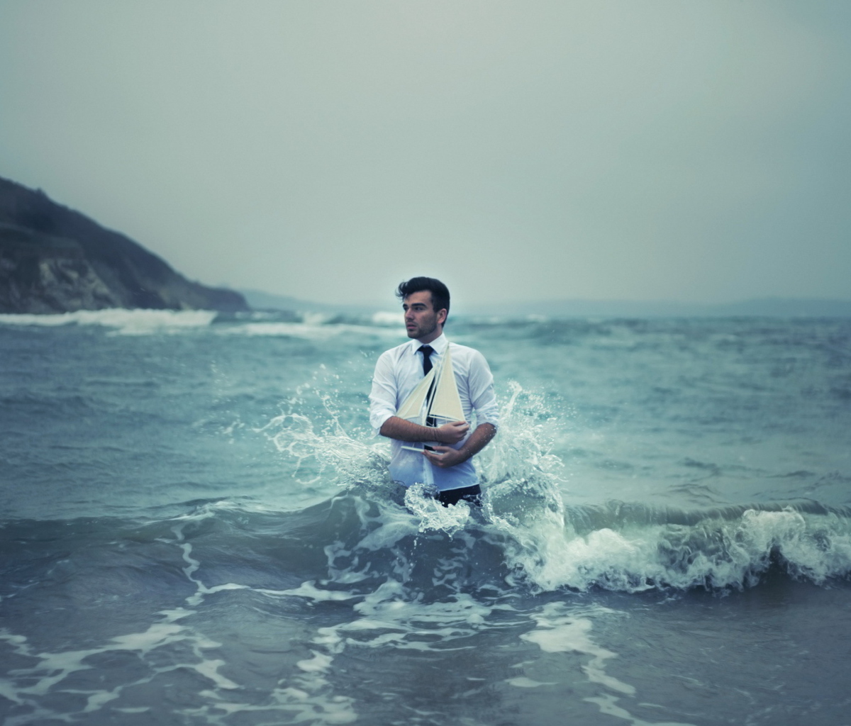 Man With Ship In Hands And Ocean Waves Around Him screenshot #1 1200x1024