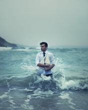 Man With Ship In Hands And Ocean Waves Around Him screenshot #1 176x220