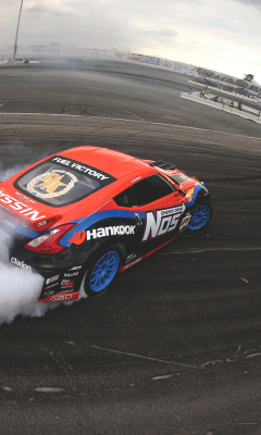 Обои Nissan 370Z Drift 240x400