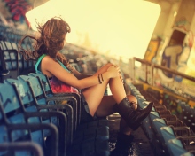 Das Girl Sitting In Stadium Wallpaper 220x176