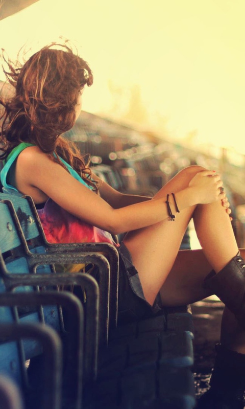 Fondo de pantalla Girl Sitting In Stadium 480x800