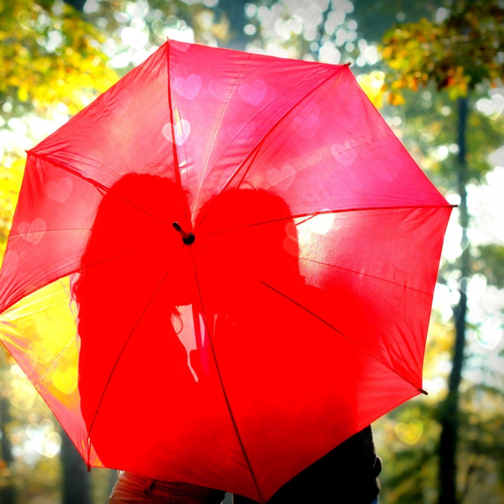 Das Couple Behind Red Umbrella Wallpaper 1024x1024