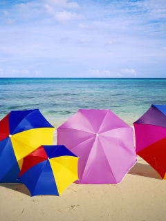 Обои Umbrellas On The Beach 240x320