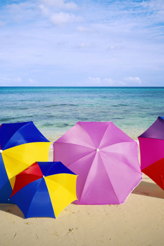 Umbrellas On The Beach wallpaper 320x480