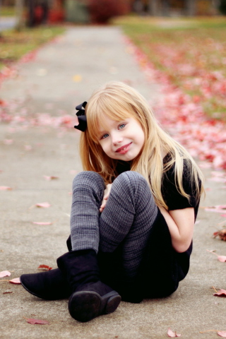 Little Blonde Girl In Autumn Park wallpaper 320x480