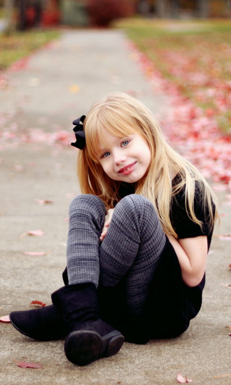 Little Blonde Girl In Autumn Park wallpaper 768x1280