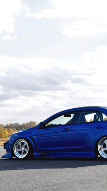 Обои Mitsubishi Lancer Evolution X 360x640