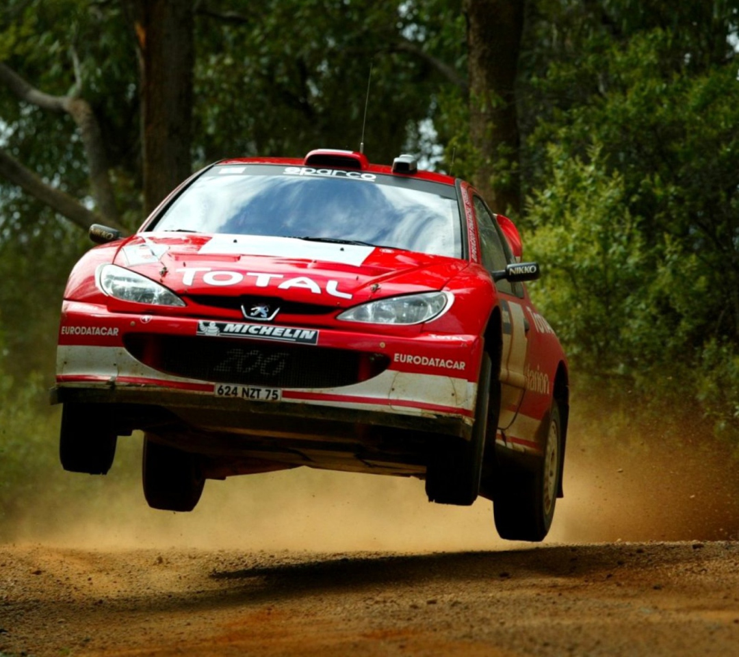 Sfondi Auto Racing WRC Peugeot 1080x960