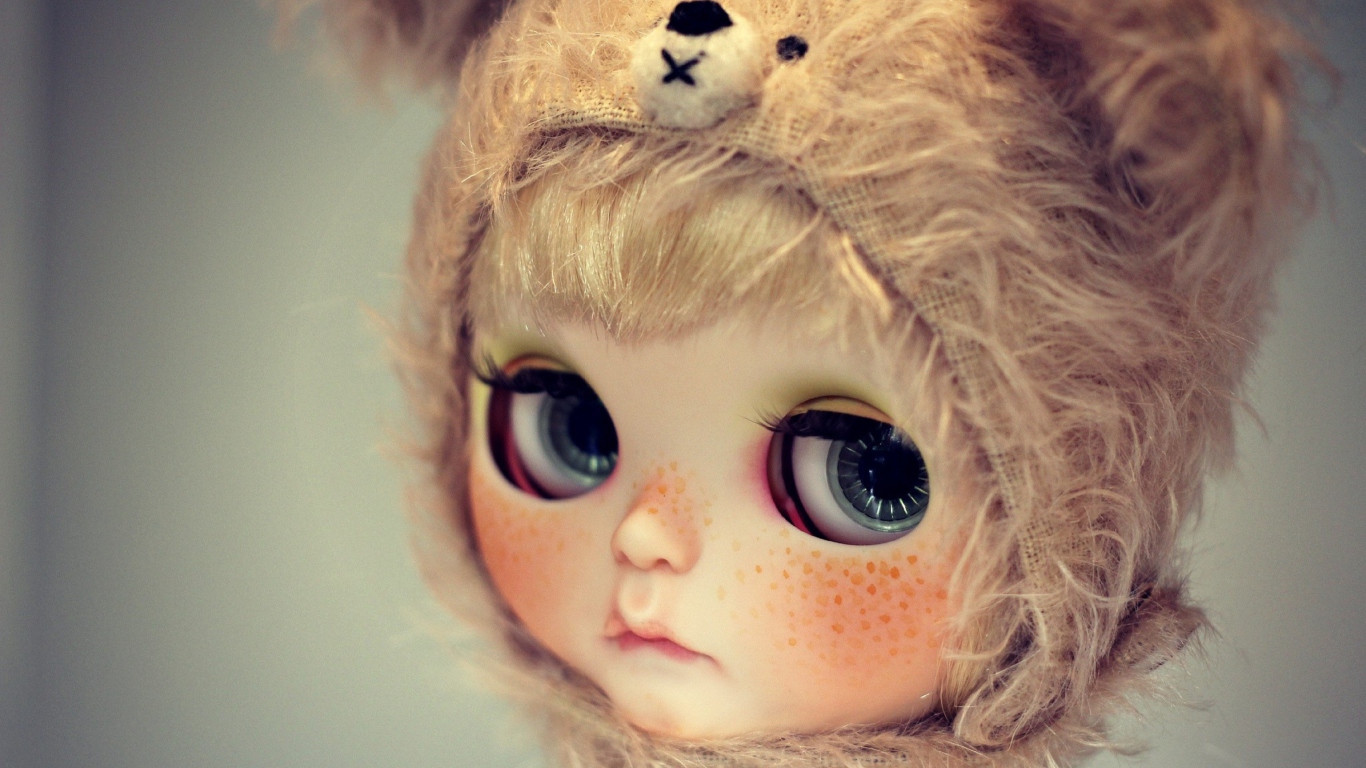 Cute Doll With Freckles wallpaper 1366x768
