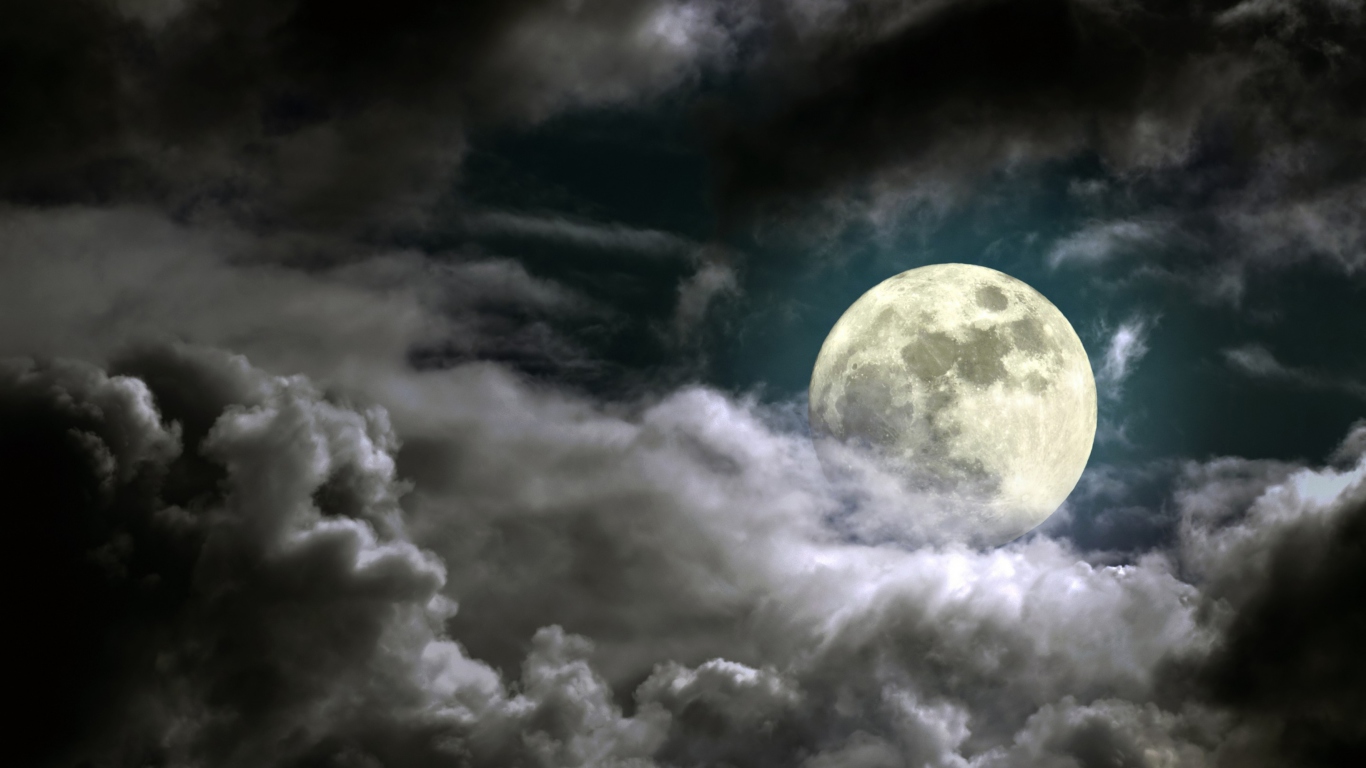 Full Moon Behind Heavy Clouds wallpaper 1366x768