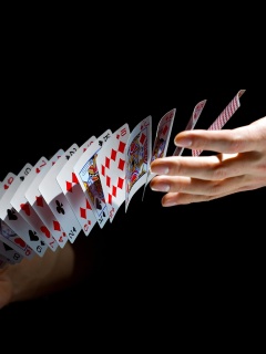Playing cards trick wallpaper 240x320