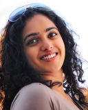 Обои Actress Nithya Menon 128x160