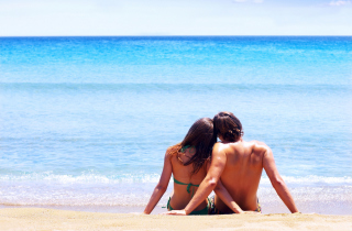 Couple On Beach Background for Android, iPhone and iPad