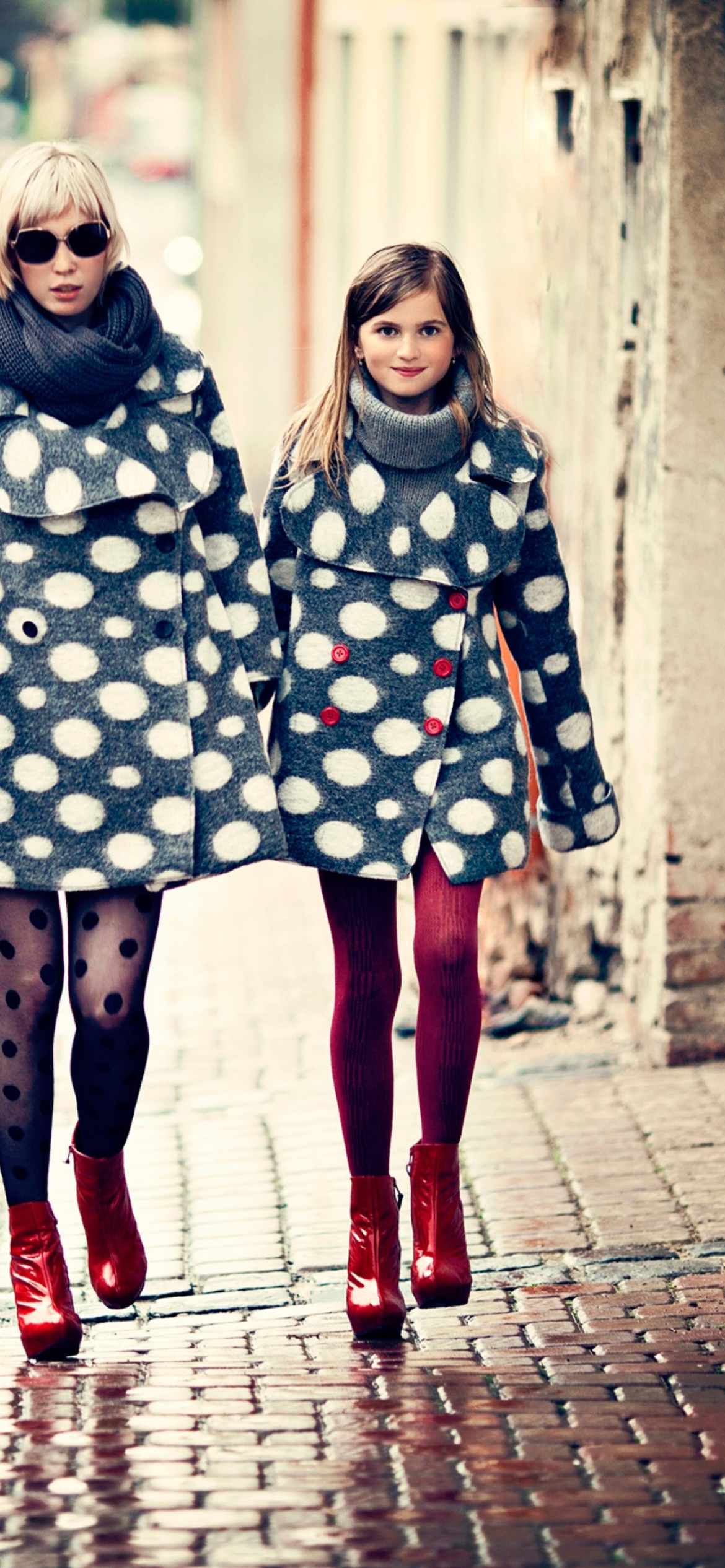 Mother And Daughter In Matching Coats wallpaper 1170x2532