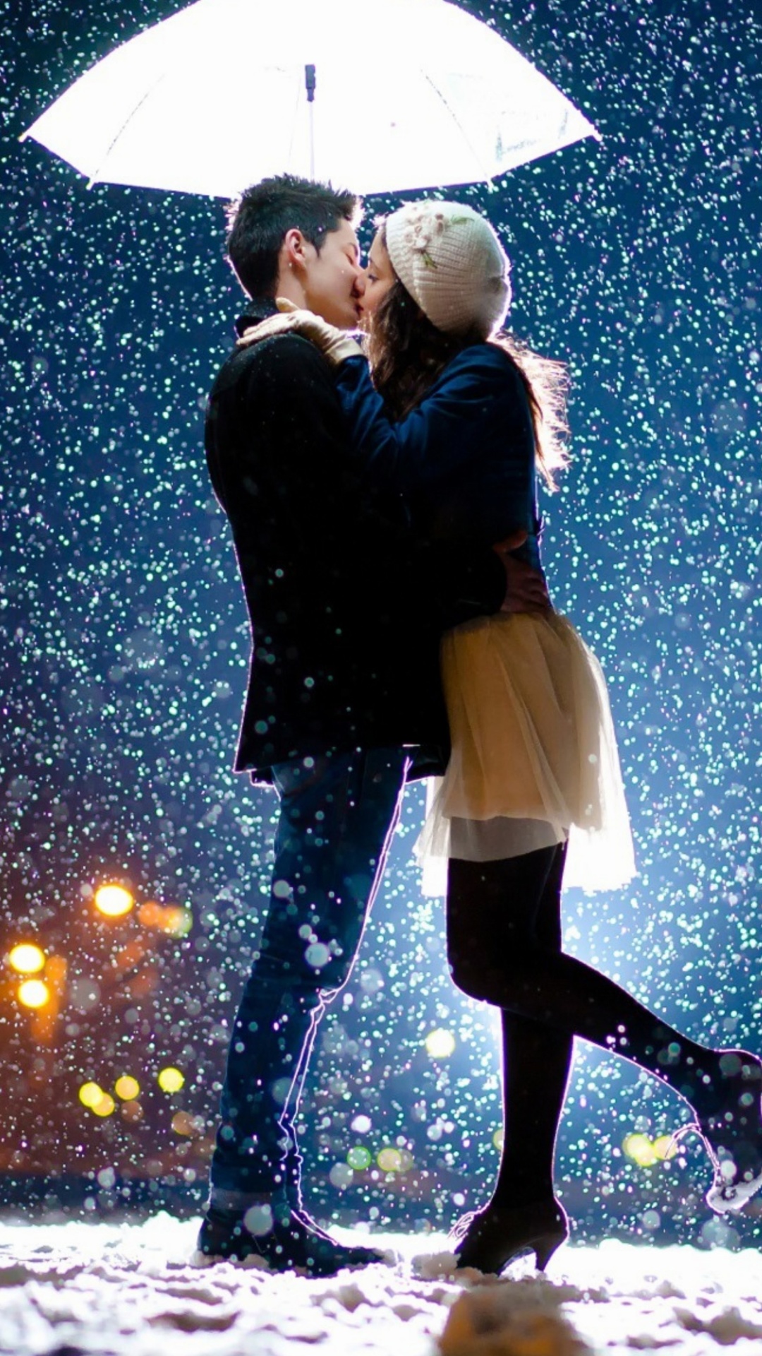 Kissing under snow wallpaper 1080x1920