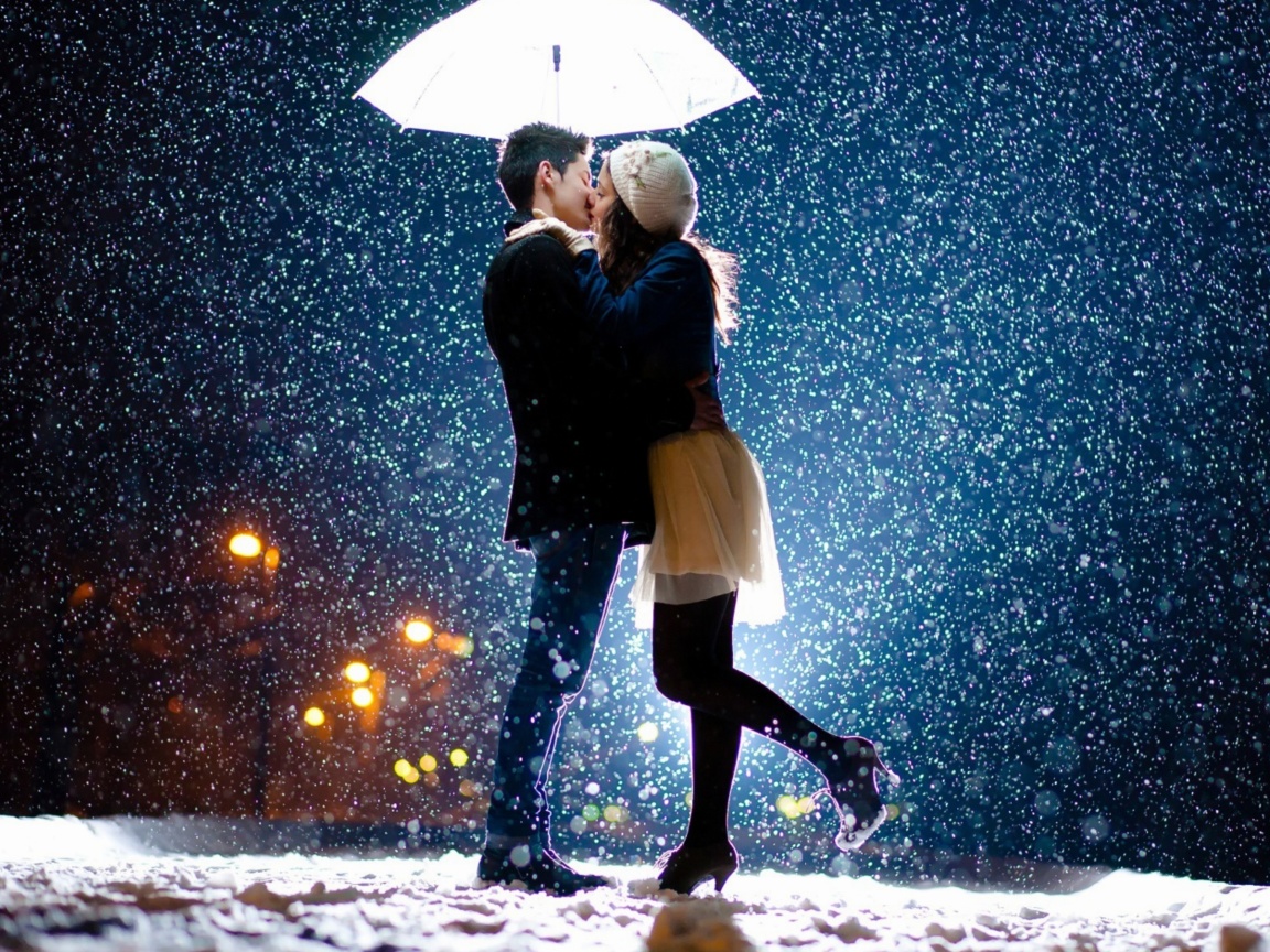 Обои Kissing under snow 1152x864