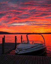 Lake sunrise with boat wallpaper 176x220