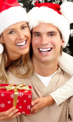 Fondo de pantalla Happy Couple In Christmas And New Year's Eve 240x400