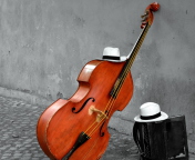 Screenshot №1 pro téma Contrabass And Hat On Street 176x144