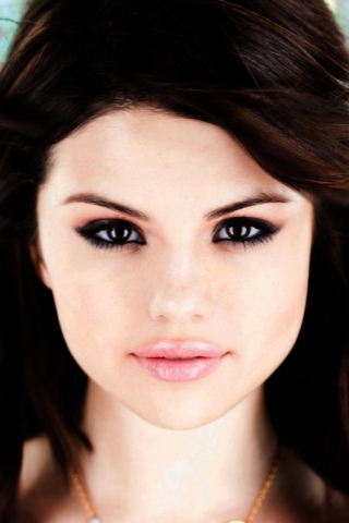 Selena Gomez Portrait wallpaper 320x480