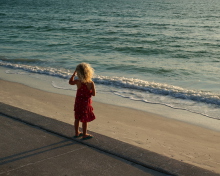 Child Looking At Sea wallpaper 220x176