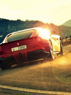 Das Ferrari F12 Berlinetta At Sunset Wallpaper 240x320