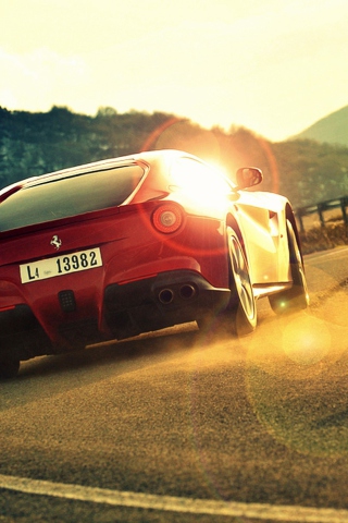 Fondo de pantalla Ferrari F12 Berlinetta At Sunset 320x480