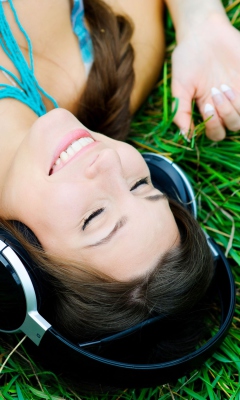 Smiling Girl Listening To Music wallpaper 240x400