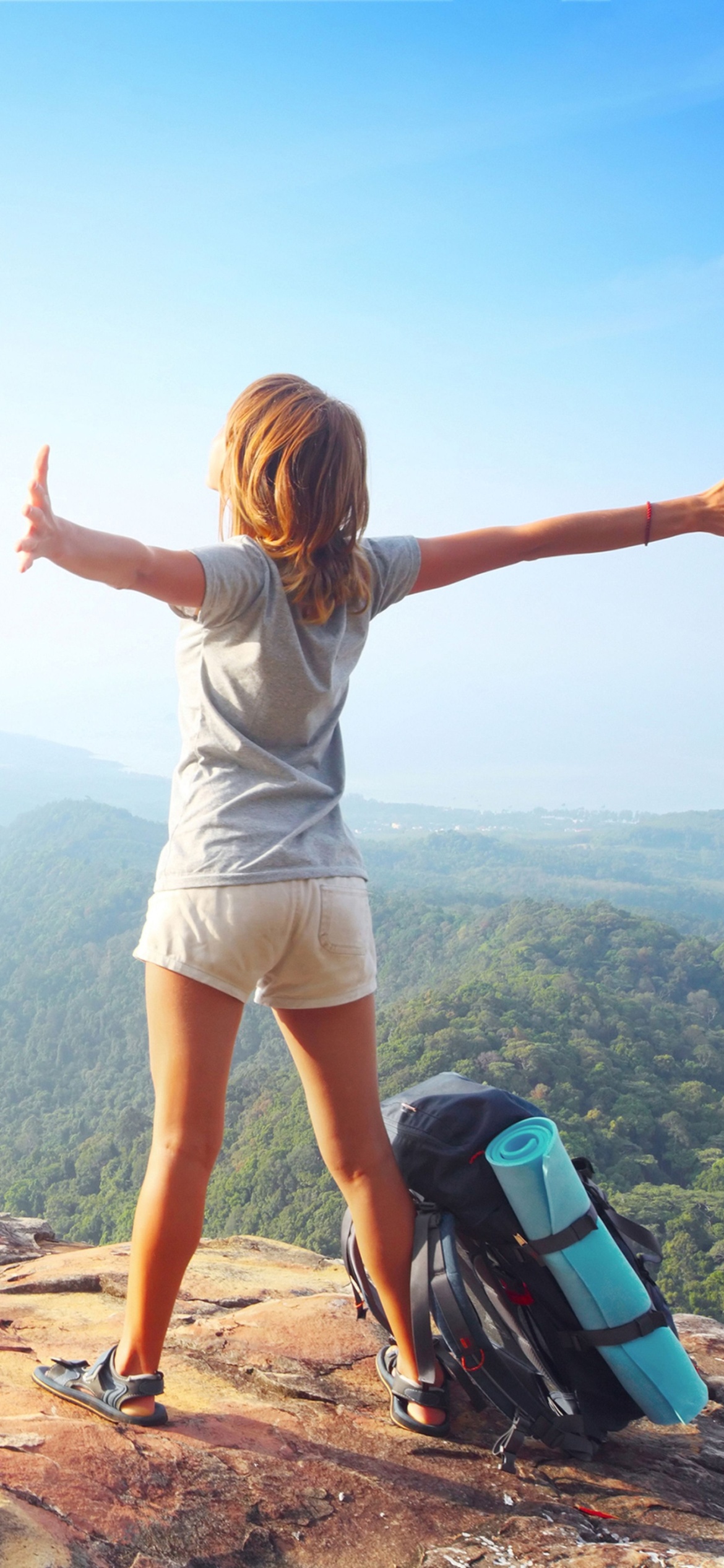 Backpacker tourist girl wallpaper 1170x2532