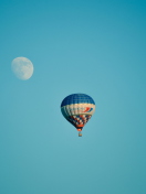 Sfondi Air Balloon In Blue Sky In Front Of White Moon 132x176