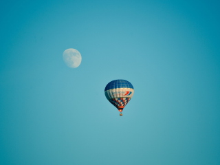 Das Air Balloon In Blue Sky In Front Of White Moon Wallpaper 320x240