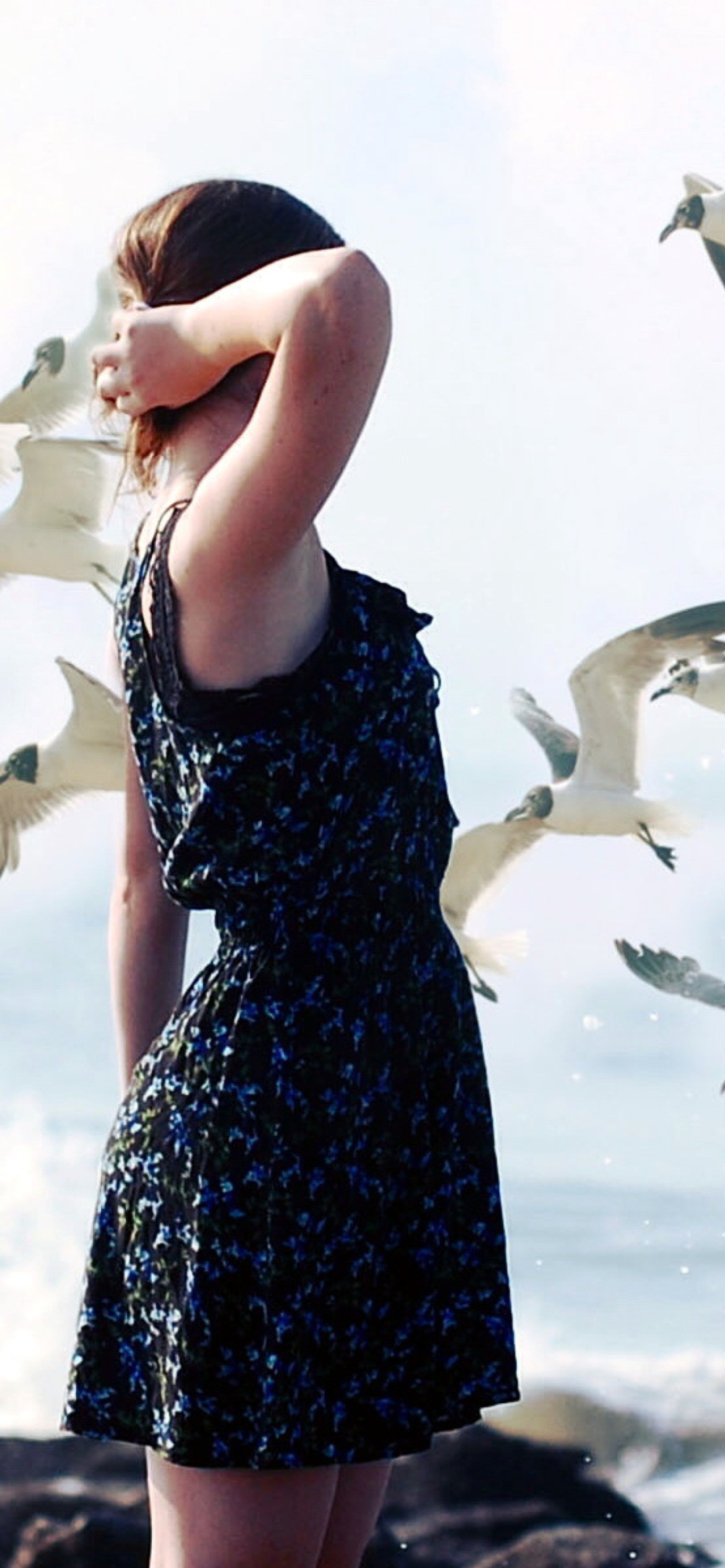 Girl On Sea Coast And Seagulls wallpaper 1170x2532