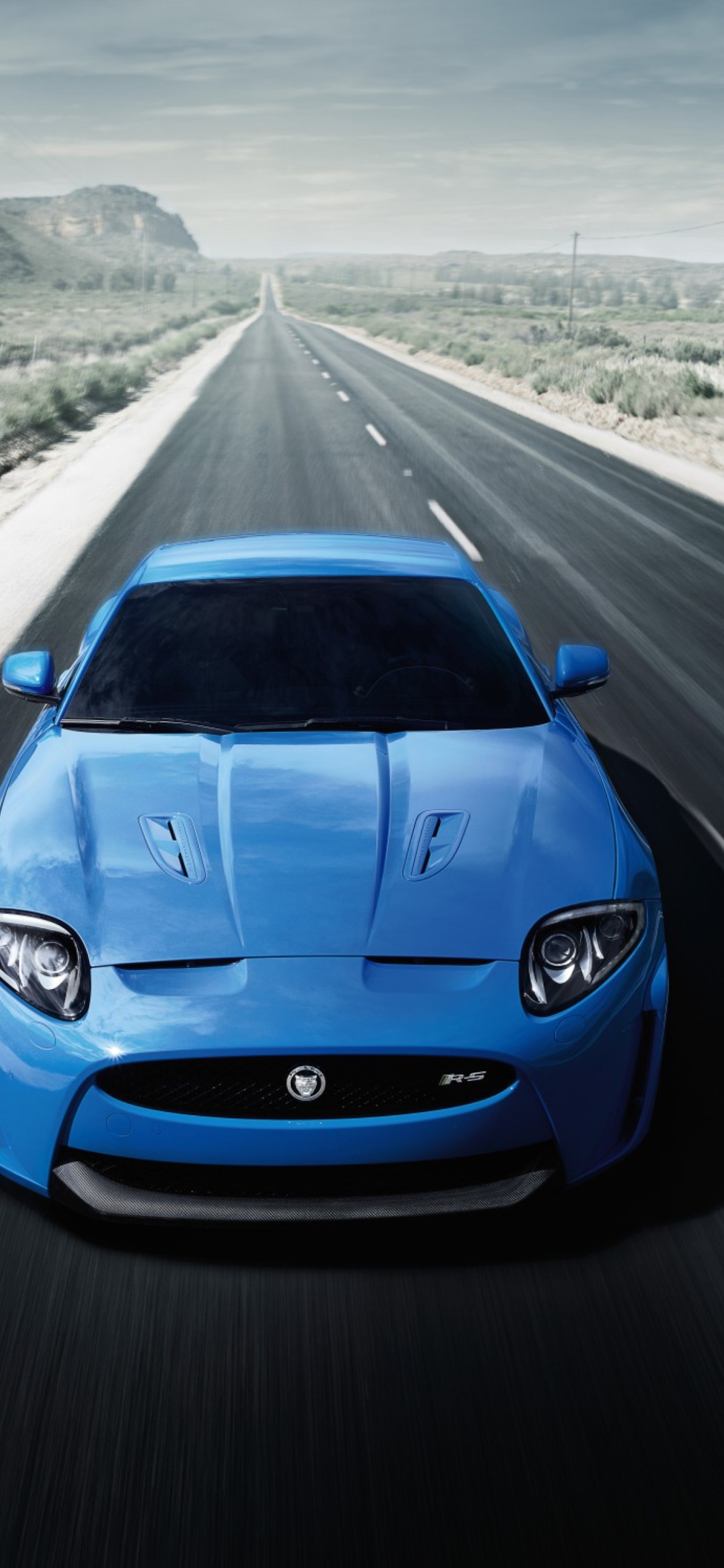 Das Blue Jaguar XKR Wallpaper 1170x2532