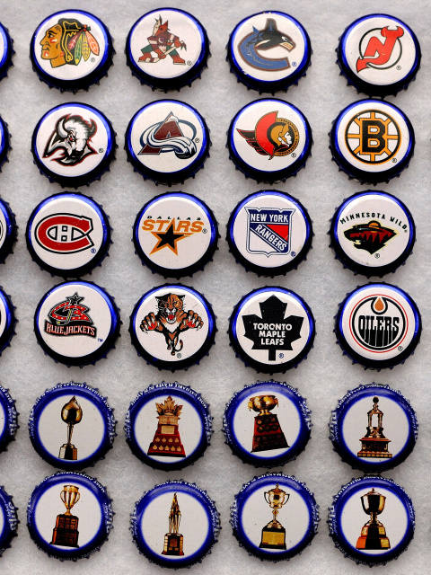 Fondo de pantalla Bottle caps with NHL Teams Logo 480x640