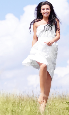 Happy Girl In White Dress In Field wallpaper 240x400