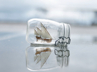 Das Toy Ship In Bottle Wallpaper 320x240