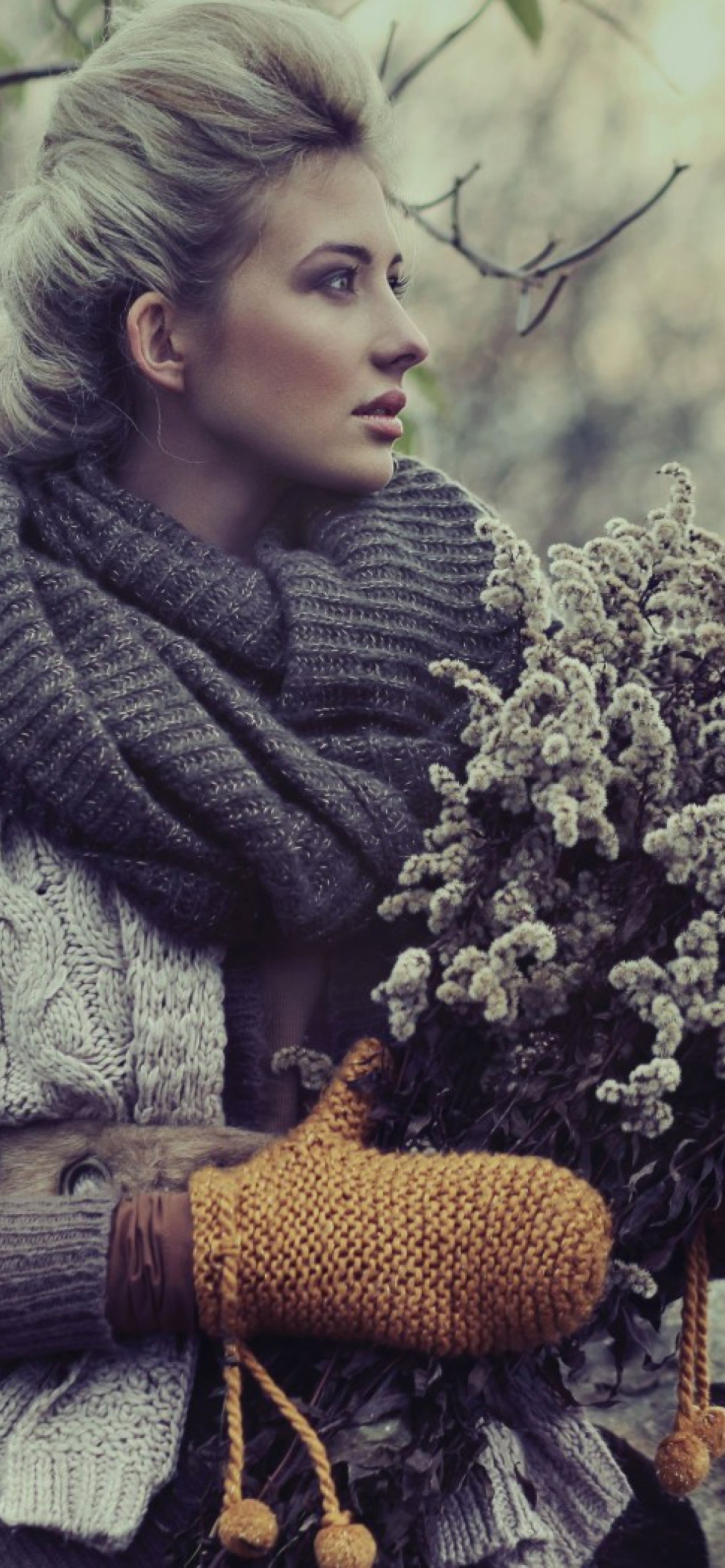 Girl With Winter Flowers Bouquet wallpaper 1170x2532