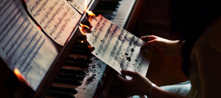 Sheet Music in Fire wallpaper 720x320