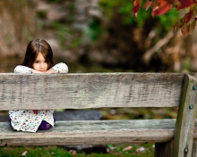 Child Sitting On Bench wallpaper 220x176