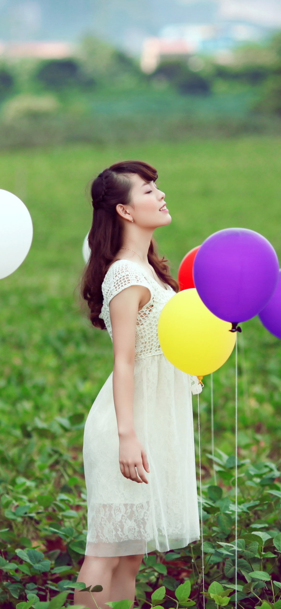 Girl And Colorful Balloons wallpaper 1170x2532