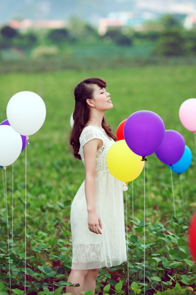 Girl And Colorful Balloons wallpaper 640x960