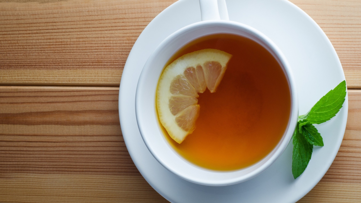 Sfondi Tea With Lemon 1366x768